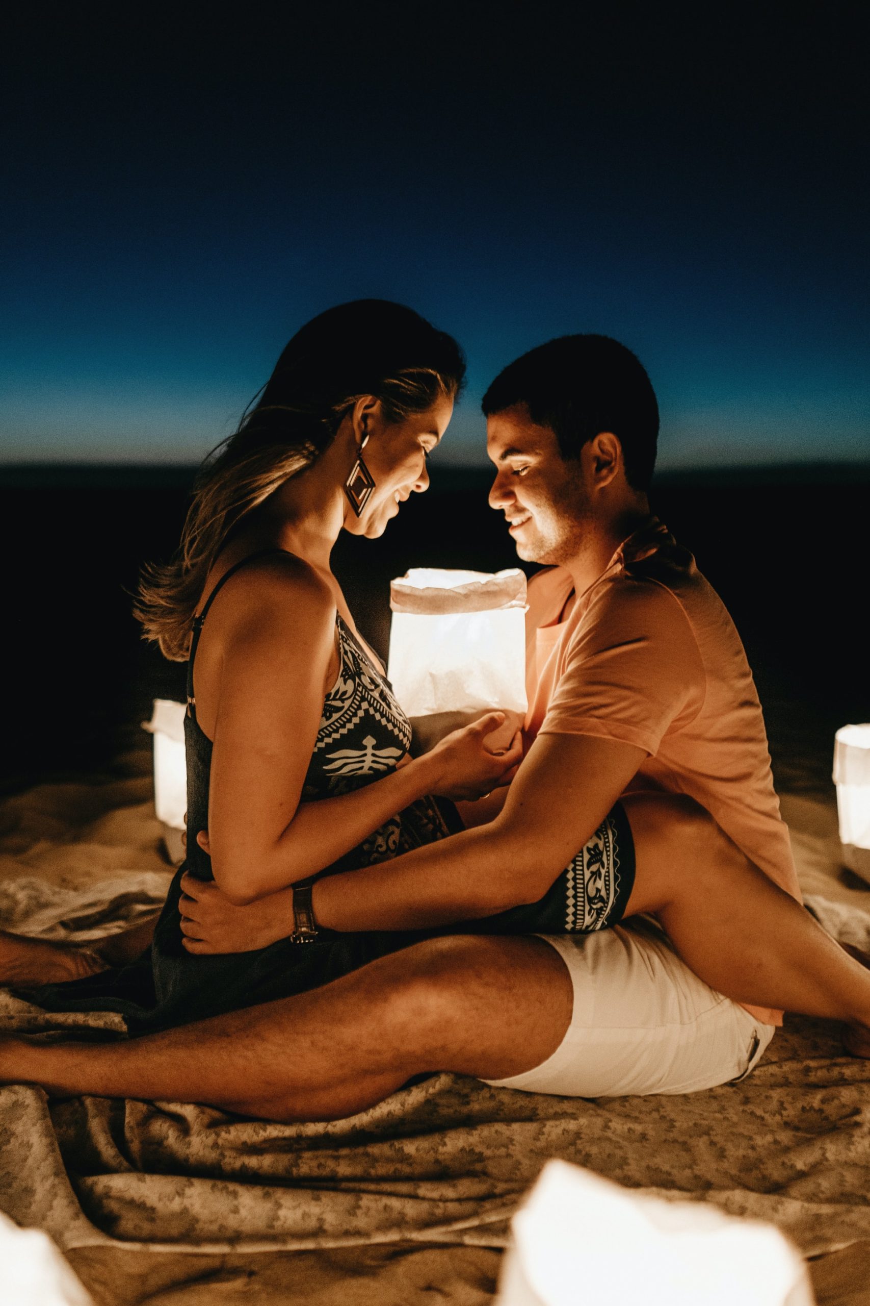 a man and woman sitting on a couch