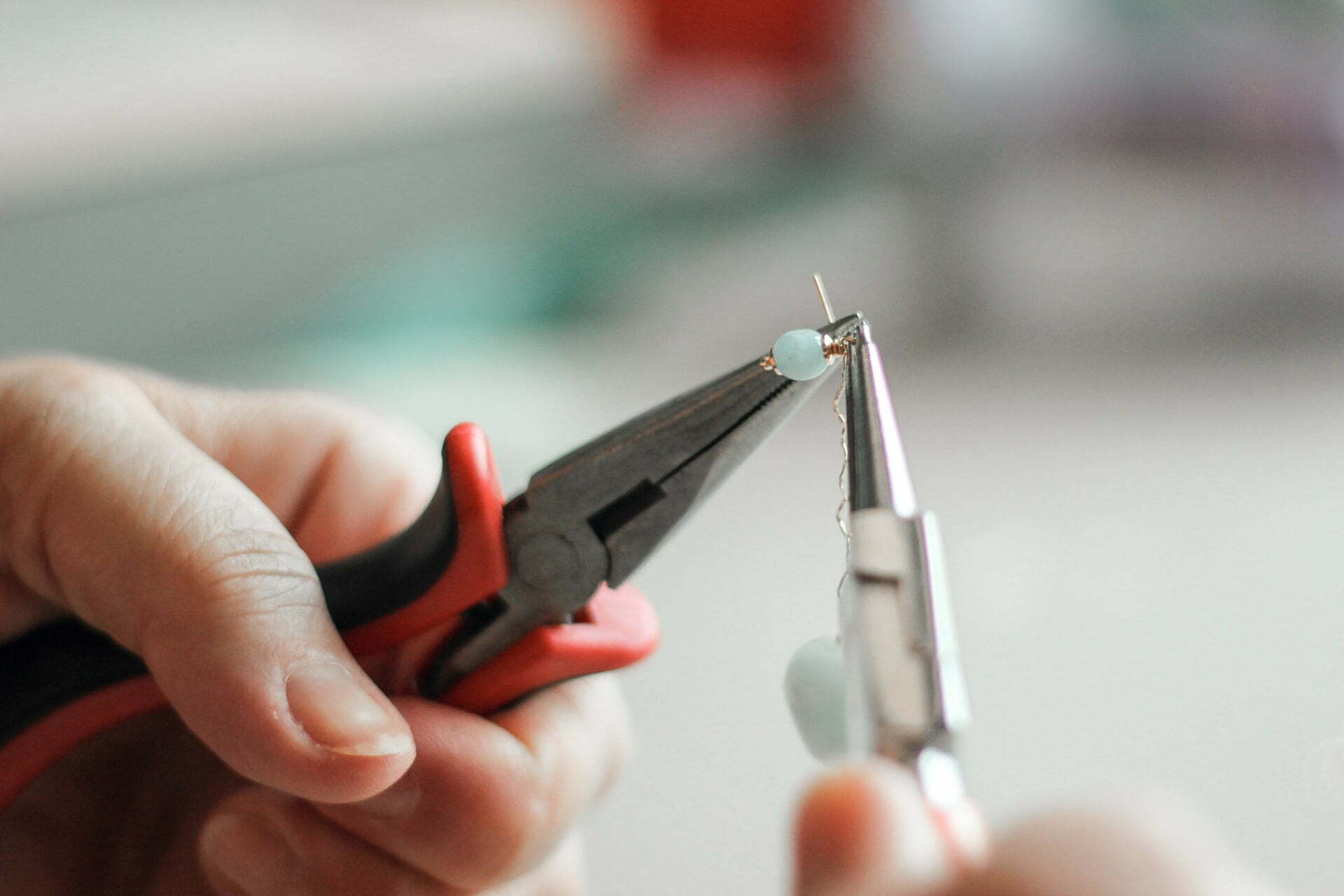 a person holding a small fishing rod